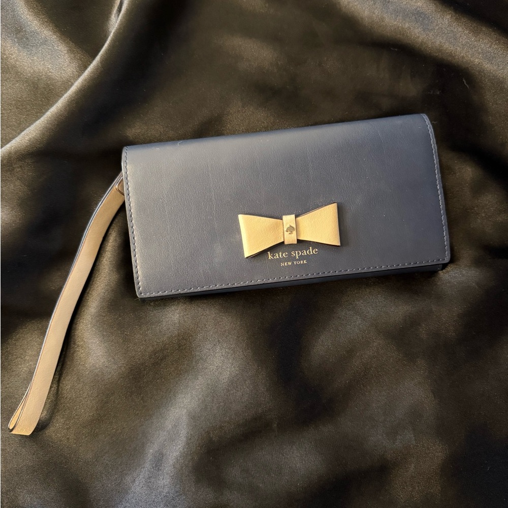 Kate Spade Black Wristlet with Gold Bow
